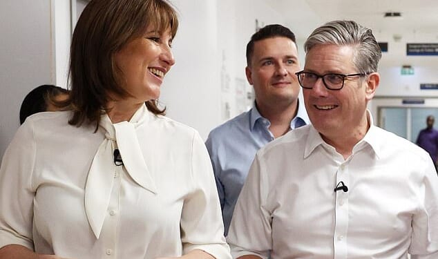 Keir Starmer is holding a press conference defending the Budget and begging Labour MPs to stick with his 'long term plan' amid recriminations at Rachel Reeves (pictured together)