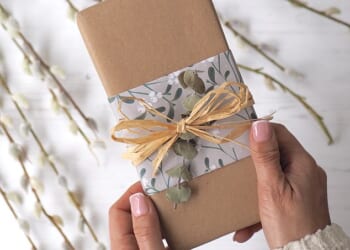 Professional gift wrapper Jane Means revealed five present wrapping trends in 2025 - one of the standouts being a preference for incorporating eco-inspired materials like matte kraft paper