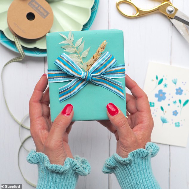 Another popular trend in 2025 was to forgo plastic and glittery finishing touches in favour of natural elements, like plant sprigs