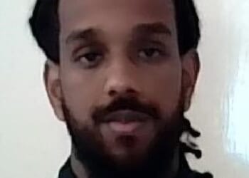 Mahad Elmi, 27, left the open jail in Buckinghamshire and is now unlawfully at large, Thames Valley Police said