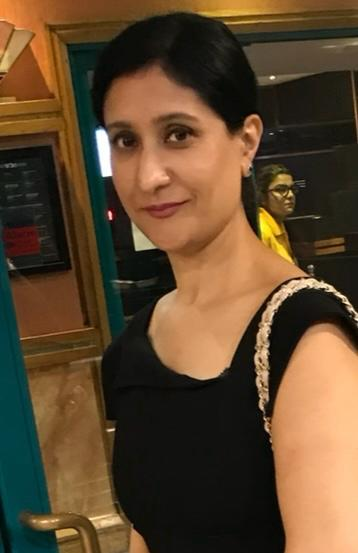 Portrait of Rucksana Ellahi, a single mum struggling with bills.