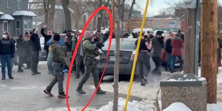 An immigration officer used a paintball gun to help disperse hostile anti-ICE protesters Monday in Minneapolis, MInnesota.