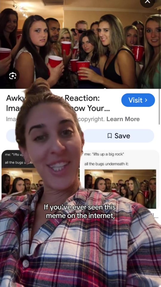 A woman in a plaid shirt smiles and points at a meme on her phone featuring a group of young adults at a party holding red cups.