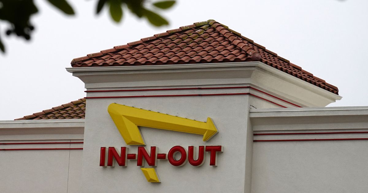 The In-N-Out Burger logo is displayed at an In-N-Out Burger restaurant on July 21, 2025, in Daly City, California.