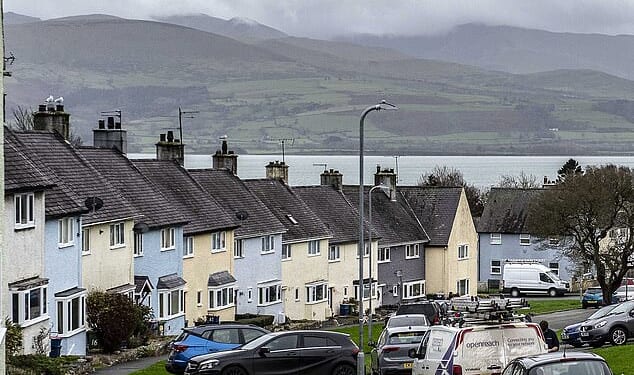 Sat on the island of Anglesey in Wales, Ffordd Meigan is lined with pastel-coloured terraced housing with a backdrop of Snowdonia