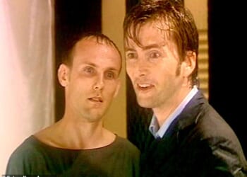 John Walker has appeared on-screen more than 2,000 times as an extra - seen here with David Tennant