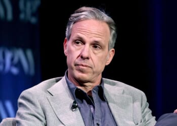 CNN anchor Jake Tapper sits on stage at an event in New York City on May 27, 2025.