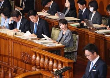 Japan’s PM promised to ‘work, work, work.’ For some, that’s a red flag.