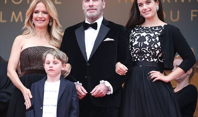 John Travolta has been mentioned in a bitter Presley family courtroom war after a newly amended lawsuit made sensational — and unproven — claims about the parentage of his teenage son; (Kelly Preston (L) and John Travolta pose with their children Ella (R) and Benjamin in 2018)