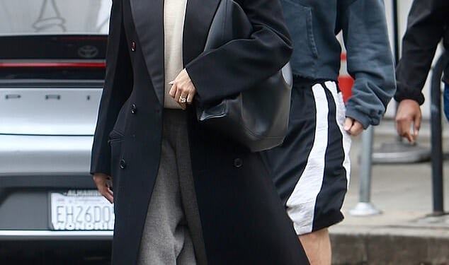 Justin and Hailey Bieber looked sullen as they stepped out for lunch in West Hollywood on Friday, December 19, just six days before Christmas