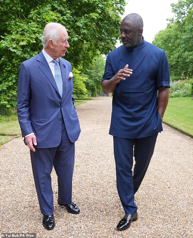 King Charles III (left) with Idris Elba who has been made a Knight Bachelor in the New Year Honours list