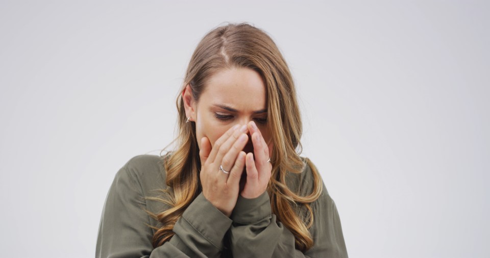 Cough, sick and woman in studio, disease and sneeze with flu season on white background. Person, mockup and pain with tuberculosis, cover mouth and concern with sinus problem, medical and influenza