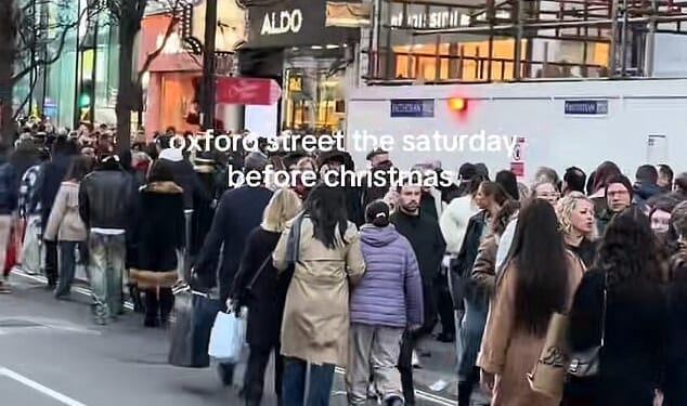 Videos shared on social media show shoppers packed shoulder-to-shoulder as they try to make their way down Oxford Street