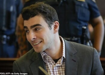 Luigi Mangione appeared upbeat as he arrived back in court on Monday, days before the anniversary of his alleged assassination of healthcare CEO Brian Thompson