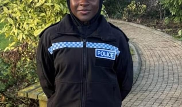Magnetic hijabs could be rolled out across police forces in an effort to attract more female Muslim recruits. Pictured: PC Hafsah Abba-Gana models the new design