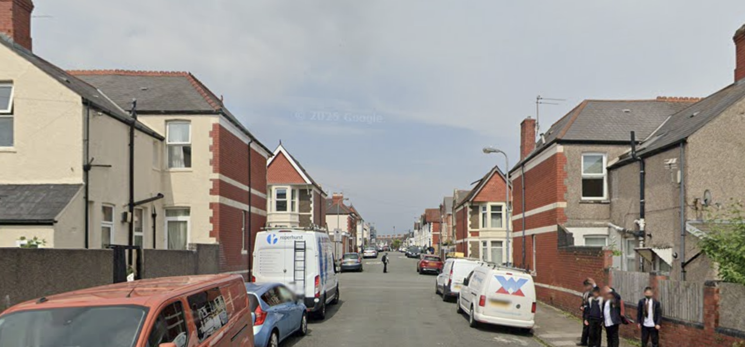 Pentyrch Street in Cardiff, with a street full of houses and cars.