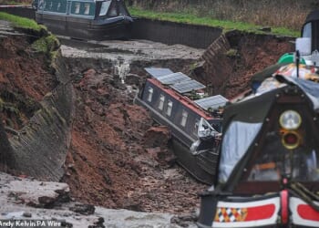 Ben Wood, 75, had to jump off his sinking narrowboat as it descended into the massive hole left by the canal breach