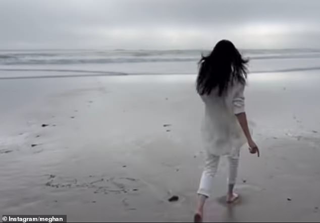 But fans noted a possible blunder - in the left hand corner (pictured) of the video, another outline of '2025' could be seen marked in the sand, suggesting that the duchess, now 44, may have practiced the scene several times in a bid to achieve the perfect final take
