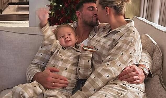 Molly-Mae Hague and Vogue Williams get passionate with their partners as they lead the celeb families enjoying Christmas in coordinating pyjamas