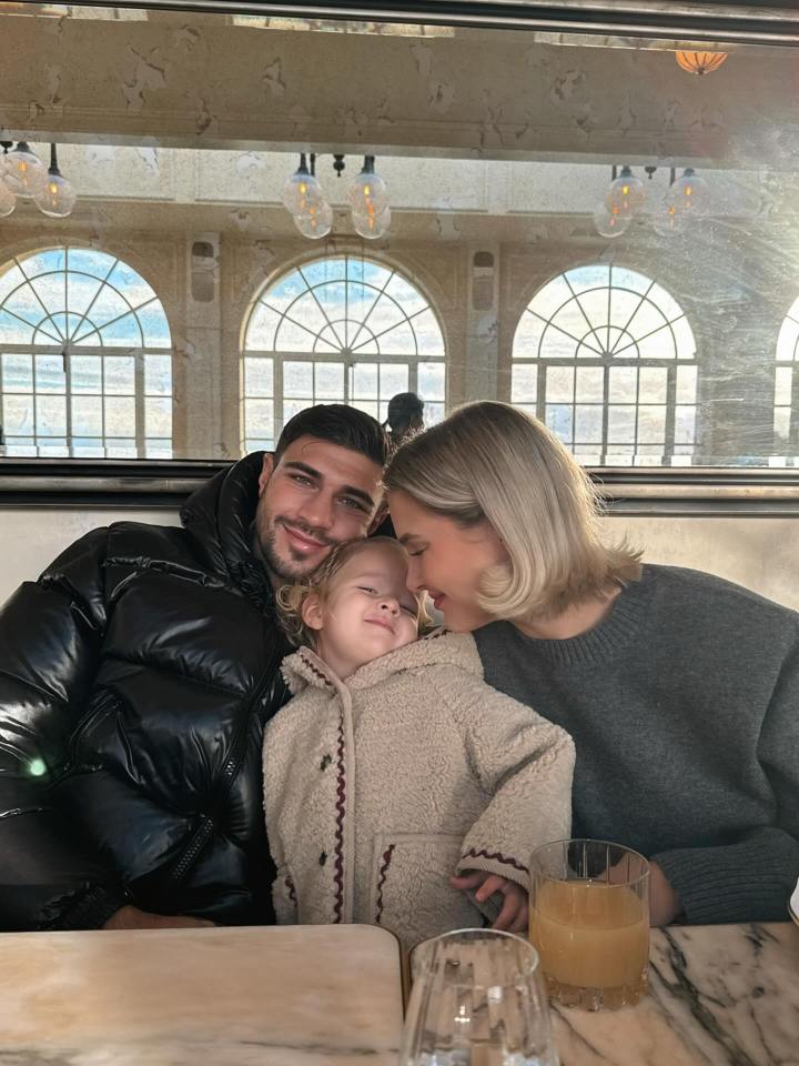 Molly Mae, Tommy, and Bambi posing for a photo.