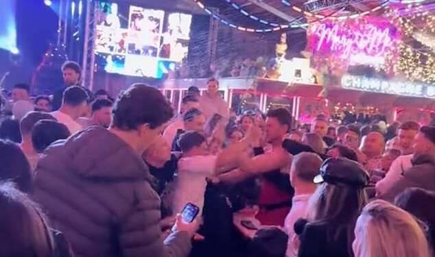 Footage uploaded to TikTok shows two males throwing punches at each other inside the Winter Wonderland's packed Bavarian Village in London's Hyde Park