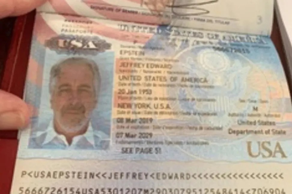 A person holding an open United States passport for Jeffrey Edward Epstein, showing his photo, birth date, and passport issue and expiration dates.
