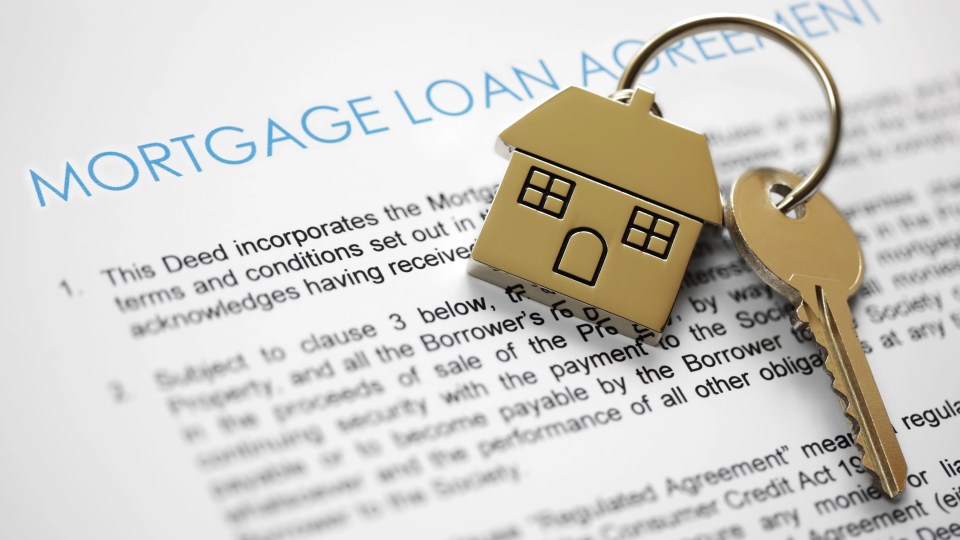 House key on mortgage loan agreement.