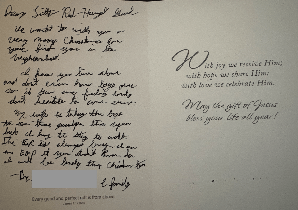 Christmas card with a handwritten message on the left and a printed message with religious text on the right.