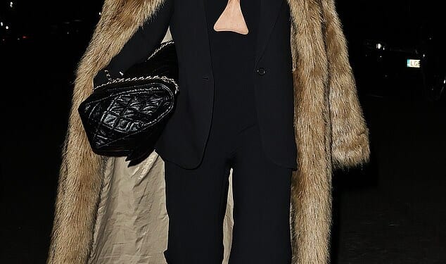 Myleene Klass, 47, turned heads in a plunging top and glamorous fur as she led stars attending Piers Morgan's Christmas party on Friday evening