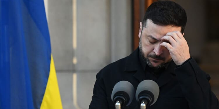 Ukrainian President Volodymyr Zelenskyy speaks with Ireland's Taoiseach Michael Martin at a government building in Dublin, Ireland on Dec. 2, 2025.