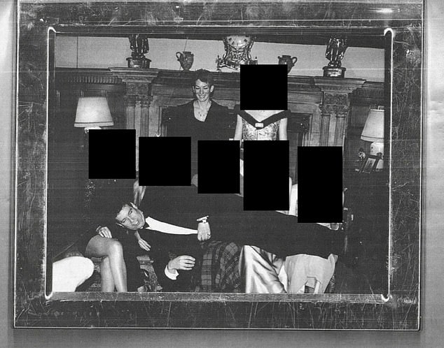 A picture of Andrew Mountbatten-Windsor lying across a row of women in a photo during a black-tie event with Ghislaine Maxwell has been released as part of the Epstein files