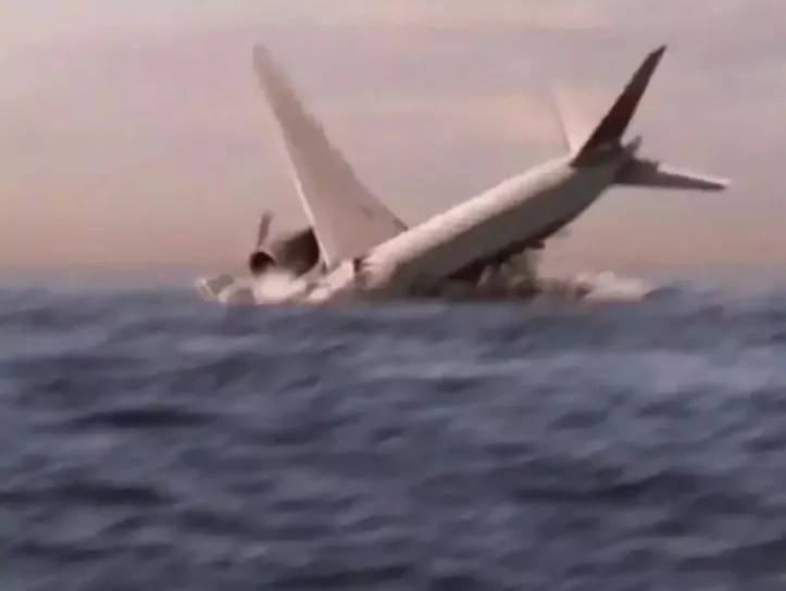 Airplane crash-landing into the sea.