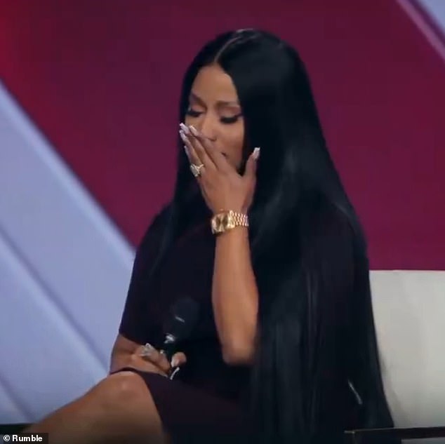 The singer quickly put her head in her hands as she used the poor choice of words