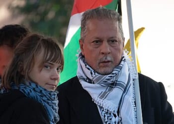 Mohammad Hannoun, the president of the Palestinian Association in Italy, (pictured, right) was photographed with Greta Thunberg (pictured, left) at a pro-Palestine rally in Rome in November