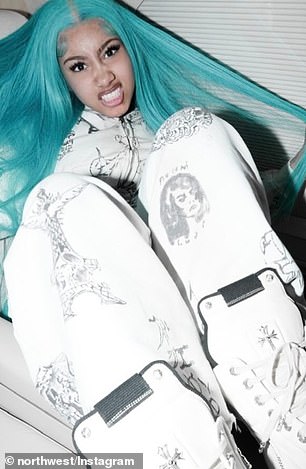 To complement the latest accessory, the tween sported what's become her signature turquoise-colored hair