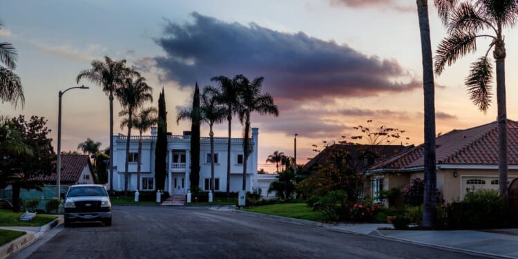 Dusk falls over one of the many mansions on Nov. 18, 2024, in Downey, California.