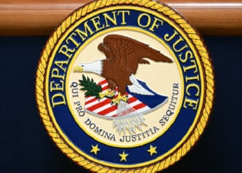 The seal of the U.S. Department of Justice.