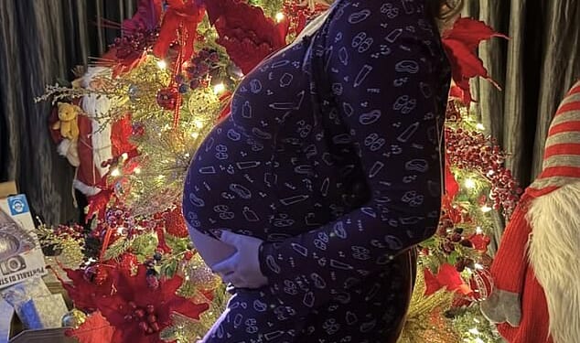 Pregnant Perrie Edwards, 32, cradled her baby bump as she posed for gorgeous Christmas snaps in front of her tree