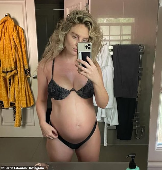 Pictured during her pregnancy with Axel