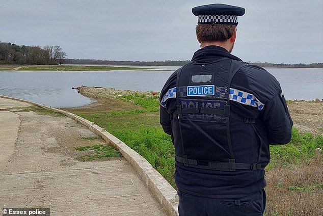 Essex Police were first called to the scene of the 'serious incident' shortly after 2pm on Sunday at the Hanningfield Reservoir between Chelmsford and Billericay (pictured)