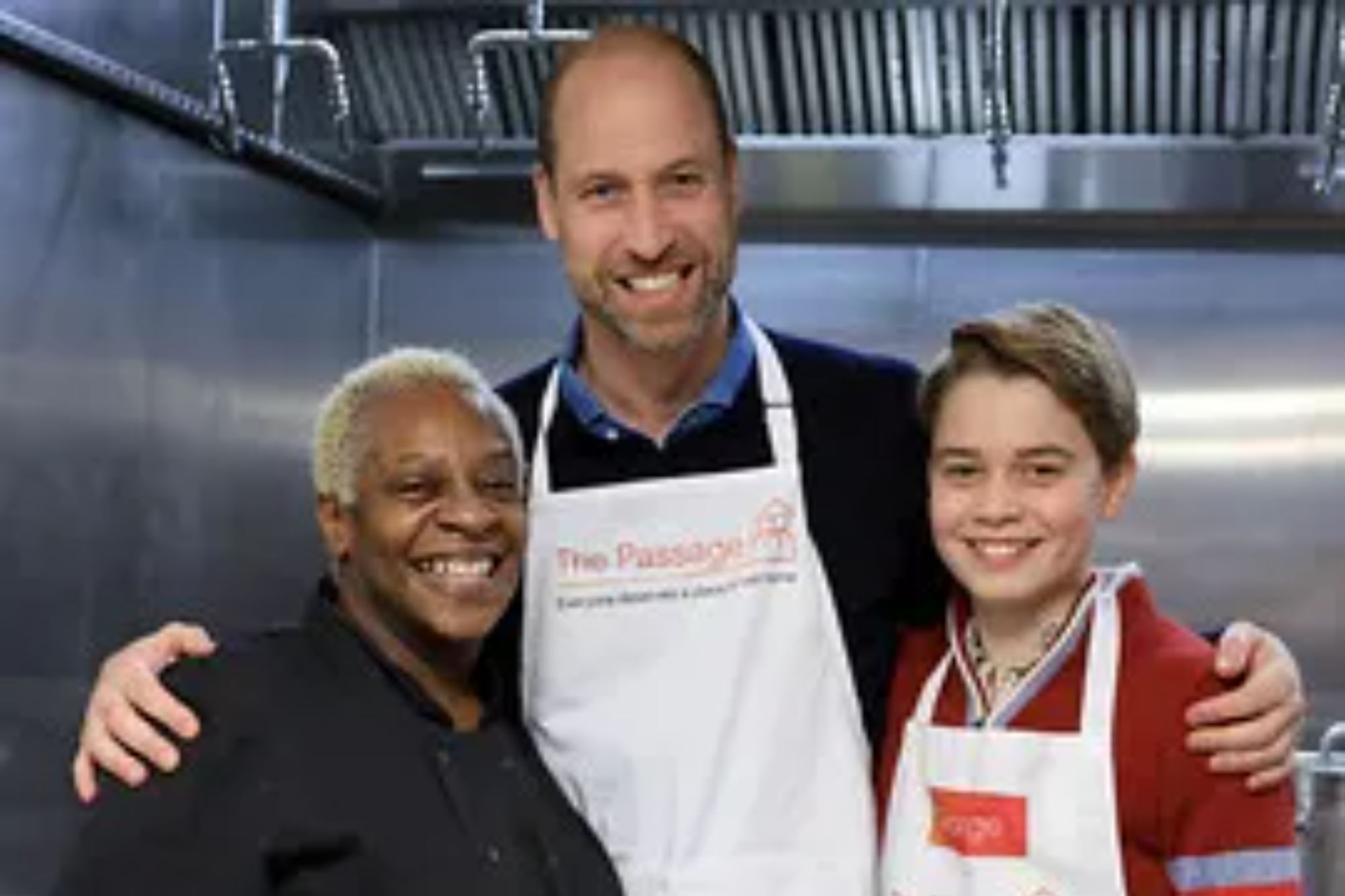 An image collage containing 1 images, Image 1 shows Prince William and Prince George posing with a woman in a kitchen, all wearing "The Passage" aprons