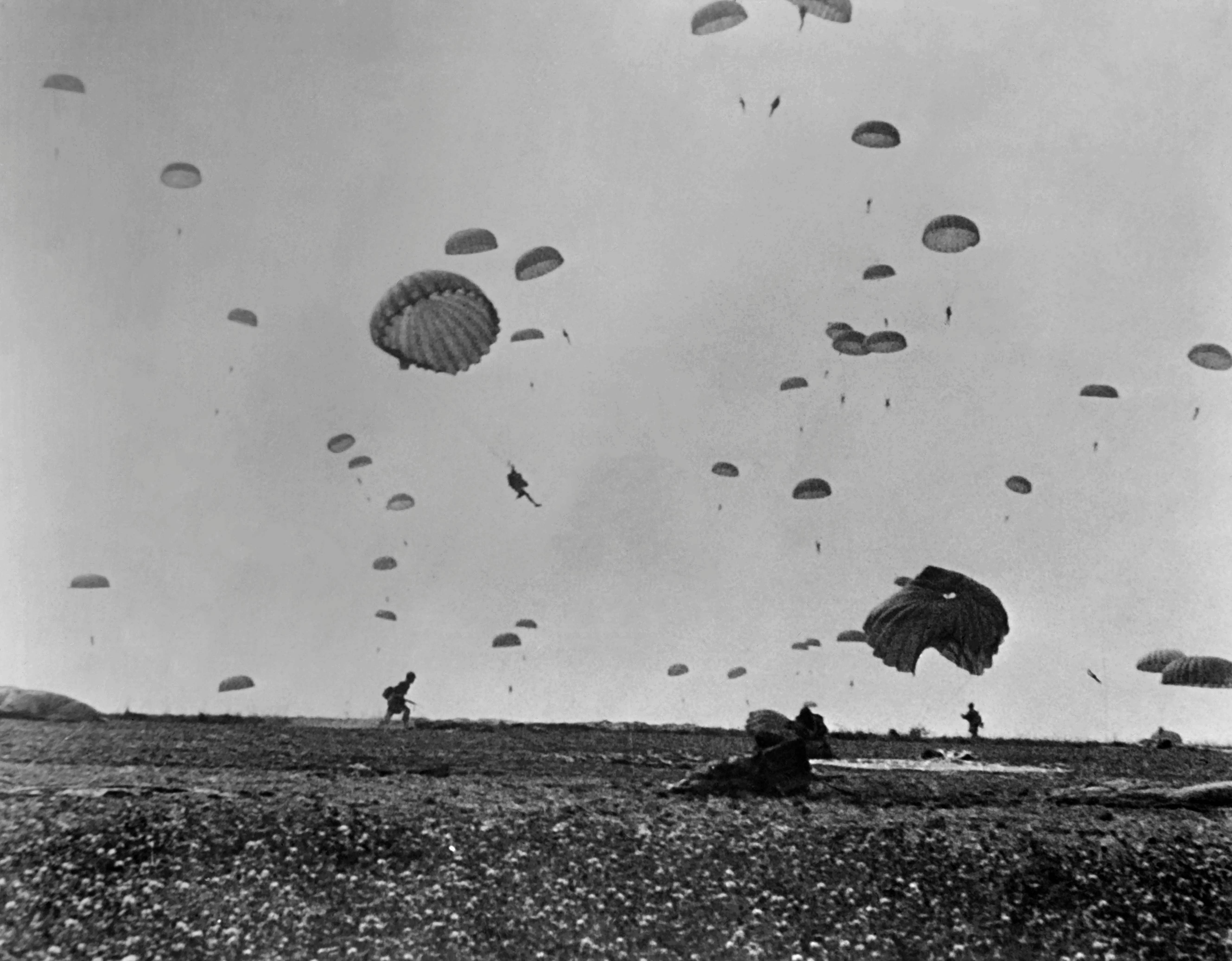 Allied forces paratroopers landing on La Manche coast during D-Day.