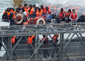 The U.K. Border Force vessel brings migrants who were intercepted crossing the English Channel into Dover port on Oct. 8, 2025, in Dover, England.