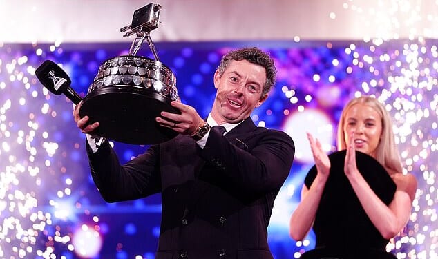 Rory McIlroy lifts the SPOTY gong, presented to him by 2024 winner Keely Hodgkinson