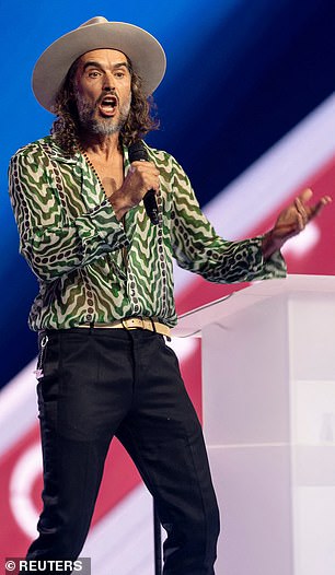 Brand tied politics into the discussion of Perry's new romance with the left-leaning pol while speaking to a conservative audience for the group founded by the late Charlie Kirk