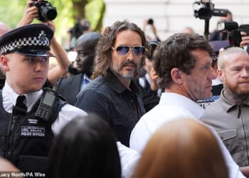 Russell Brand is seen arriving at Westminster Magistrates' Court in London on May 2 2025