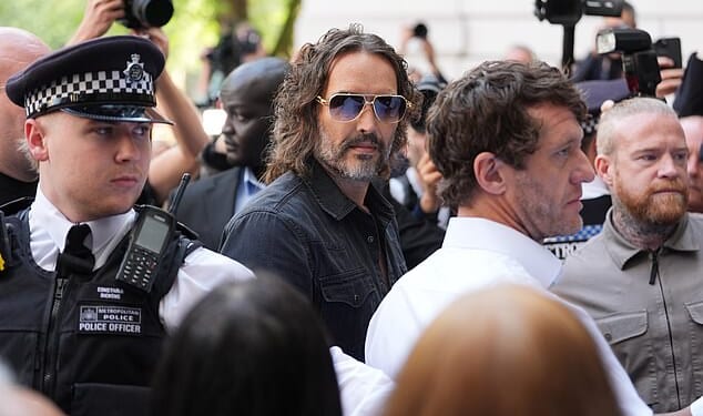 Russell Brand is seen arriving at Westminster Magistrates' Court in London on May 2 2025