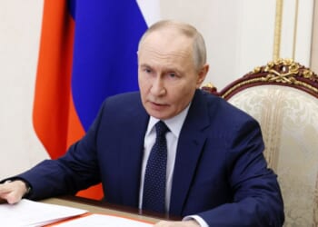 In this pool photograph distributed by the Russian state agency Sputnik, Russian President Vladimir Putin chairs a Security Council meeting via videolink in Moscow on Dec. 26, 2025.