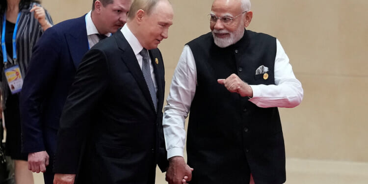 Russia and India hold summit as Trump threatens sanctions