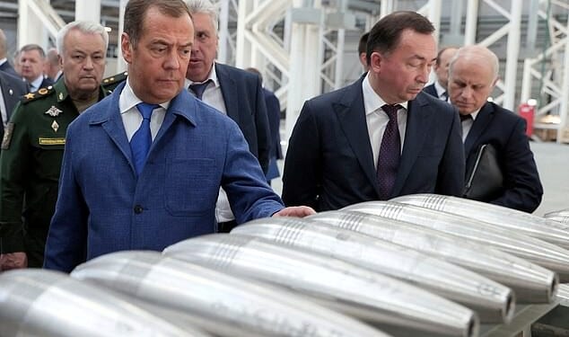 Russia's deputy head of the Security Council Dmitry Medvedev (left) has threatened to kill Volodymyr Zelensky